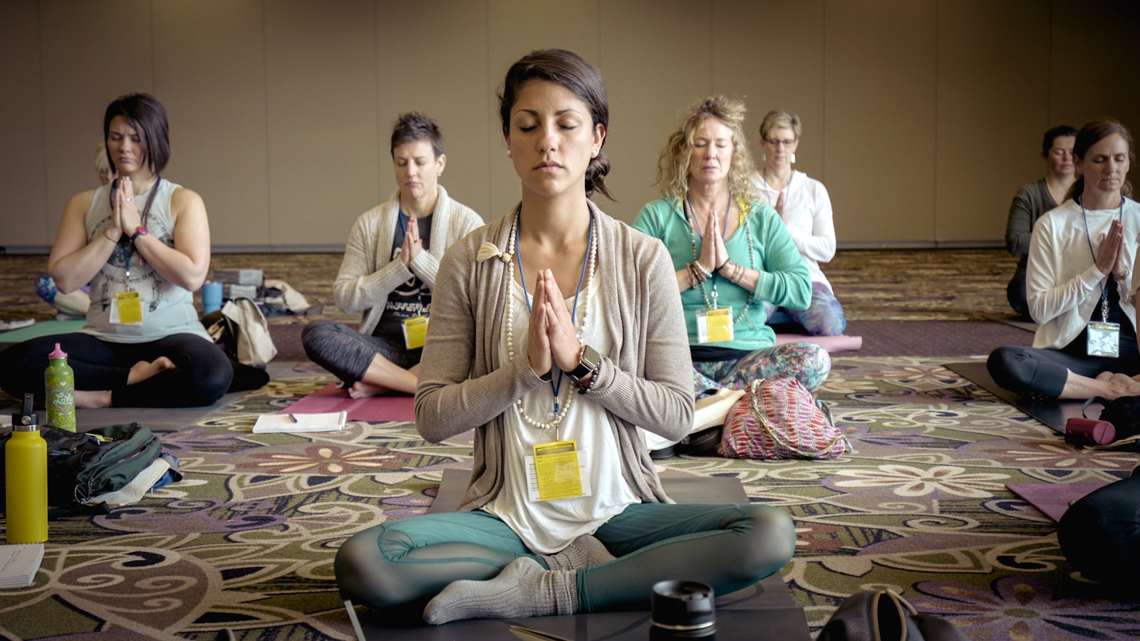 Photo by Erik Brolin group of people doing yoga
