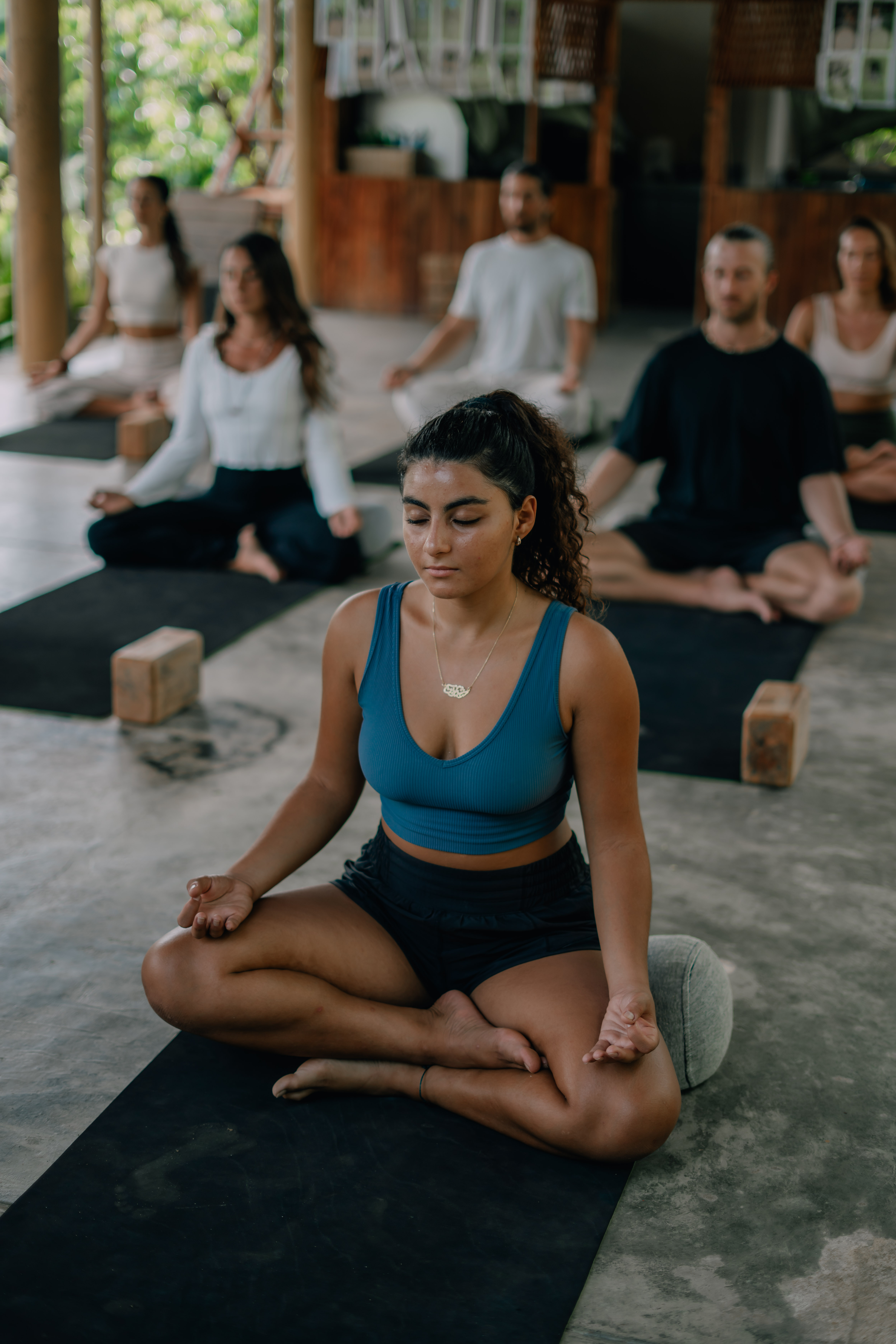 group of people doing yoga